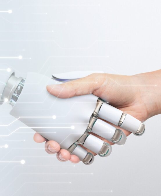 Human,Hand,Shaking,Robot,Hand,,Symbolizing,Human-robot,Collaboration,And,Technology.
